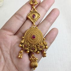 Fine Quality Gold-plated Maang Tikka is an antique Indian bridal jewelry piece, inspired by temple jewelry. Perfect for weddings, this forehead accessory is ideal for Pakistani bridal looks. Its traditional design and intricate craftsmanship make it a timeless gift for her, adding elegance to any special occasion. *𝐏𝐑𝐎𝐃𝐔𝐂𝐓 𝐃𝐄𝐓𝐀𝐈𝐋* * Material: Brass * Plating: Gold Plated *𝐃𝐈𝐌𝐄𝐍𝐒𝐈𝐎𝐍𝐒* *    Weight 18 gm Each, Length 2.2 Inches, Width 1.5 Inches, Top Chain Length: 2.6 Inches 22k Gold Tikka With Intricate Design, Yellow Gold Temple Jewelry Tikka For Festive Occasions, Festive 22k Gold Temple Jewelry Tikka, Festive Yellow Gold Tikka In Temple Jewelry Style, Festive Yellow Gold Temple Jewelry Tikka, Diwali 22k Gold Tikka With Intricate Design, Traditional 22k Gold Tikka, Gold Temple Jewelry Tikka For Festivals, Gold Chandbali Tikka For Puja