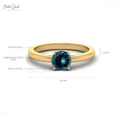 Description Shine brighter with the Solitaire Anniversary Ring, crafted in 14k Solid Gold and featuring a 6mm London Blue Topaz gemstone. This prong-set beauty is perfect for celebrating special moments, adding a touch of luxury to any occasion. A true symbol of timeless elegance and enduring love. Product Details SKU CJ R 1349 LBT Product dimension 21.62mm x 4.43mm Metal 14k Solid Gold Birthstone December London Blue Topaz Details Stone size 6mm Quality AAA Stone pieces 1 Stone weight 0.57 cara Gemstone Solitaire Ring, Topaz Yellow, Solid Gold Ring, December Birthstone, London Blue Topaz, Topaz Gemstone, Dainty Ring, London Blue, Anniversary Ring