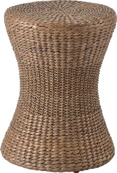 a brown wicker stool on a white background with the top half covered in woven material