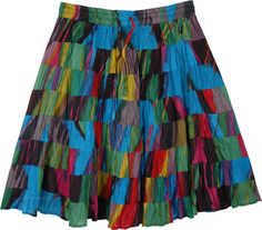 A lined short cotton skirt in blue and green print and made in 8 tiers of increasing circumference which gives it flare, volume and bounce. This skirt will be knee length or shorter or longer depending on how tall you are. It has an elastic waistband and drawstring and the skirt easily fits sizes small to large. Multicolor Cotton Tiered Mini Skirt, Multicolor Tiered Cotton Mini Skirt, Multicolor Cotton Ruffled Skirt, Multicolor Flared Cotton Mini Skirt, Multicolor Cotton Flared Mini Skirt, Multicolor Cotton Knee-length Skirt, Multicolor Knee-length Cotton Skirt, Green Cotton Tiered Mini Skirt, Green Tiered Cotton Mini Skirt