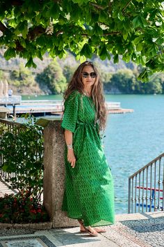 Our Costa Smeralda silk/cotton maxi kaftan dress dazzles the eyes with its vibrant emerald green color! This dress would be the perfect piece to wear for a night out in Sardinia's Costa Smeralda. It is sure to make you feel like a princess! This dress is luxurious, comfortable, iridescent, and inimitable! Our silk/cotton ikat fabric is handwoven and is of the highest quality! It is so luxurious that you will not want to ever take it off! Ii breathes beautifully and works great in humid climates! Maxi Dress Silk, Ikat Maxi Dress, Costa Smeralda, Maxi Kaftan, Vacation Fashion, Emerald Green Color, Silk Kaftan, Indian Block Print, Feel Like A Princess