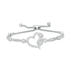 A delightful symbol of your devotion, this diamond tilted heart bolo bracelet from the I Promise To™ Collection shines as an unmistakable sign of your forever love. Created in sterling silver, this look showcases a sculpted infinity symbol wrapped around one side of a heart-shaped outline. Diamonds line the center design in shimmer while diamond stations - each artfully set to enhance size and sparkle - glisten between beaded links. Radiant with 3/8 ct. t.w. of diamonds and a brilliant buffed lu Adjustable Heart-shaped Diamond Jewelry, Adjustable Diamond Heart Bracelet For Valentine's Day, Valentine's Day Adjustable Diamond Heart Bracelet, Adjustable Diamond Jewelry For Valentine's Day, Adjustable Heart Cut Fine Jewelry, Valentine's Day Adjustable Diamond Jewelry, Heart Shaped Diamond Bracelet For Valentine's Day, Adjustable White Gold Diamond Bracelet For Anniversary, Adjustable Diamond Bracelet For Anniversary