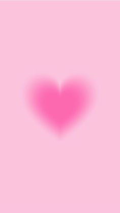 a pink heart on a pink background