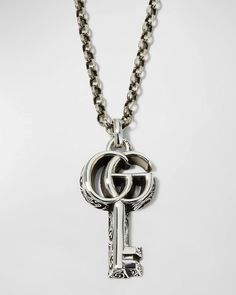 Elevate your Instagram style with this timeless Gucci double-G key pendant necklace. Crafted from sterling silver hardware with lustrous black onyx gemstone, showcase your personal design sensibilities for just the right touch of sophistication. At just under 20 inches in length, the subtle yet distinctive logo key effortlessly complements a variety of necklines. Cared for with a soft cloth, this heritage-inspired pendant makes the perfect addition to your daily looks or special occasions for its enduring luxurious charm. Silver Key Necklace, Key Charm Necklace, Castle On The Hill, Key Pendant Necklace, Gucci Jewelry, Gucci Gg Marmont, Charm Necklace Silver, Sterling Pendant, Key Necklace