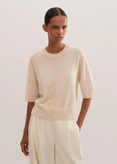 Cashmere Relaxed Crop Tee Cream Melange Effortless Crew Neck Tops For Fall, Casual Fine Knit Tops For Work, Effortless Crew Neck Spring Top, Effortless Crew Neck Top For Spring, Spring Crew Neck Knit Top For Work, Beige Crew Neck Knit Top For Layering, Fine Knit Tops For Spring Layering, Versatile Beige Tops For Daywear, Versatile Relaxed Fit Crew Neck Knit Top