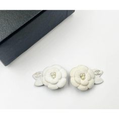 Chanel Silver CC Ivory Camellia Flower Clip on Earrings  *Marked 05 ( One of the stamps is missing.) *Made in France *Comes with the original box  -It is approximately 1.25" x 0.9". -Very classic and super cute -It is in an excellent condition. Designer White Earrings For Formal Occasions, Formal White Clip-on Flower Earrings, Luxury White Diamond Flower Earrings, Luxury White Flower Earrings For Formal Occasions, Luxury White Flower Earrings, White Classic Flower Earrings For Anniversary, Classic White Flower Earrings For Anniversary, Designer White Earrings For Anniversary, Classic White Flower Earrings For Formal Occasions