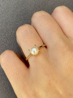 Elegant Hypoallergenic White Gold Rings, Everyday Yellow Gold Pearl Ring, Elegant Hypoallergenic Promise Ring, Elegant Hypoallergenic Rings For Everyday, Elegant Everyday Birthstone Ring With Round Band, Simple Solitaire Yellow Gold Jewelry, Minimalist Gold Sterling Silver Pearl Ring, Yellow Gold Birthstone Pearl Ring, Minimalist Yellow Gold Open Pearl Ring