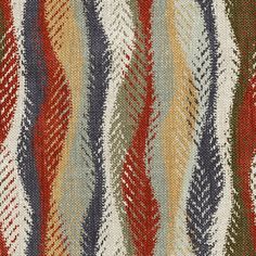 a multicolored rug with wavy lines on it