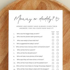 a wooden plate with a checklist on it that says, mommy or daddy?