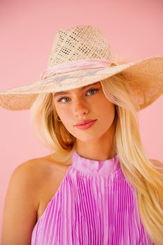 Upgrade your summer style with the LETS RACE SUN HAT! This cream sun hat features a playful racing horse design and a stylish pink ribbon band with a gold horse bit accent. Perfect for a day at the races or a sunny day at the beach. Don't horse around without this must-have accessory! This hat is ONE OF A KIND, created by our owner Stephanie. To receive item quicker, expedited shipping is available at checkout.