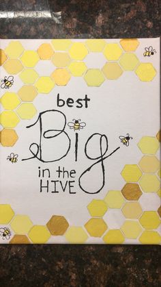 a piece of paper with the words best big in the hive on it and bees