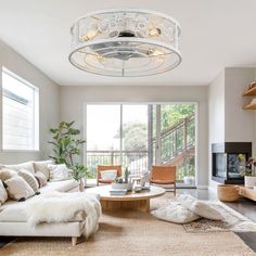 a living room filled with furniture and a fire place