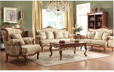 a living room filled with furniture and a chandelier