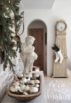 a christmas scene with ornaments and a clock