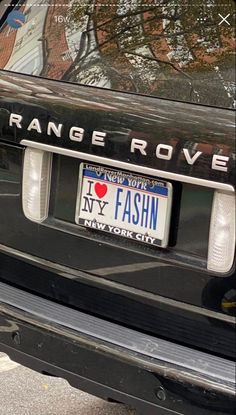 the license plate on the back of a black car that says orange rove new york