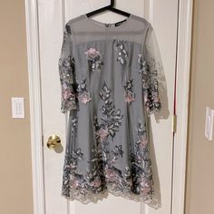 Cute Gray Dress With Floral Embroidery. Perfect For Wedding Or Evening Out. A-line Wedding Dress With Intricate Embroidery, Fitted Floral Embroidery Midi Dress For Wedding, Fitted Midi Dress With Floral Embroidery For Wedding, Fitted Floral Embroidered Midi Dress For Wedding, Spring Embroidered Fitted Evening Dress, Elegant Floral Embroidered Midi Dress For Weddings, Elegant Spring Embroidered Wedding Dress, Embroidered A-line Midi Dress For Wedding, Spring Embroidered Evening Dress