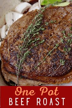 a close up of a steak on a plate with mushrooms