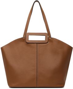 Grained leather tote in tan. · Twin carry handles and shoulder straps · Logo patch at face · Lobster clasp at interior · Detachable zip pouch at interior · Suede lining · Contrast stitching in white · H13 x W22.5 x D6 Supplier color: Tan Cognac Shoulder Bag With Handle Drop For Work, Staud Satchel Shoulder Bag For Travel, Cognac Shoulder Bag For Work, Staud Shoulder Bag For Everyday Use, Square Leather Hobo Bag With Top Carry Handle, Leather Square Hobo Bag With Top Carry Handle, Cognac Top Handle Satchel For Shopping, Classic Leather Shoulder Bag By Staud, Classic Staud Shoulder Bag For Everyday Use