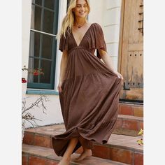 V-neck Midi Dress For Vacation, Flowy V-neck Summer Dress For Vacation, Bohemian V-neck Maxi Dress For Day Out, V-neck Maxi Dress For Beach Season Day Out, V-neck Boho Dress For Beach Party, V-neck Maxi Dress For Day Out On Vacation, Chic Flowy V-neck Beach Dress, Summer V-neck Dress For Beach Season, Chic V-neck Boho Dress For Beach Season