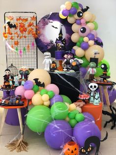 an assortment of halloween balloons and decorations