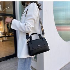 This small bag holds all the essentials: phone. keys. credit card. lipstick. and other little things. A must-have purse for everyday outings. social events. and work meetings.âœ?br data-mce-fragment="1">Material: PU. Synthetic LeatherSize: 25cm x 17cm x 11cmQuality 100%Free worldwide shipping Elegant On-the-go Satchel With Cell Phone Pocket, Elegant Satchel With Cell Phone Pocket, Trendy Everyday Satchel Phone Bag, Trendy Satchel Phone Bag For Everyday, Trendy Portable Bags For On-the-go, Trendy Travel Box Bag With Cell Phone Pocket, Chic Satchel With Cell Phone Pocket, Versatile Satchel With Mobile Phone Bag For On-the-go, Modern On-the-go Phone Bag Satchel