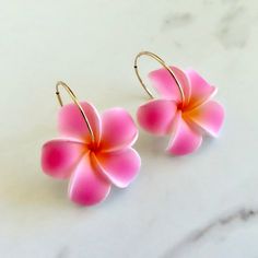 Plumeria Flower Hoops Fun Hawaiian Pink plumeria flowers on 14k gold fill endless hoops. Hoops approx. 30mm. Shop~ http://www.etsy.com/shop/HanaMauiCreations?ref=pr_shop_more International buyers please read our shipping policies before ordering~ POLICIES~ https://www.etsy.com/shop/HanaMauiCreations/policy?ref=shopinfo_policies_leftnav Summer Flower Charm Hoop Earrings, Flower Shaped Hoop Earrings For Summer Gifts, Flower Shaped Hoop Earrings For Summer, Pink Flower-shaped Jewelry For Vacation, Pink Flower Jewelry For Vacation, Pink Flower Hoop Earrings For Summer, Flower-shaped Earrings For Vacation, Adjustable Flower Earrings For Vacation, Gold Flower Earrings For Beach