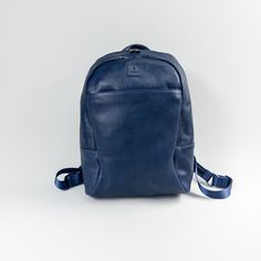 It is a wonderful backpack that will accompany you on your short trips, daily trips, cycling, plane trips, and complement your classic or casual combinations. Moreover, with the privilege of real vegetal leather. Width 30cm height 40cm Width 13 cm Large compartment for computer Inner zippered hidden pocket Large area with outer zipper (phone-cable etc.) Special thermal lining that does not sweat your back luggage squeegee lane It is made of vegetal tanned vegetal genuine calf leather by skilled Blue Leather Backpack For Everyday Use, Blue Backpack With Adjustable Strap For On-the-go, Functional Blue Backpack With Luggage Sleeve, Leather School Backpack With Luggage Sleeve, Blue Standard Backpack For Everyday Use, Everyday Blue Standard Backpack Travel Bag, Modern Blue Leather Backpack For Everyday, Modern Everyday Blue Leather Backpack, Blue Standard Backpack Laptop Bag For Everyday Use