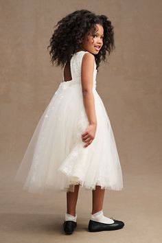 Embroidered starflowers, a cutout back, and tulle overlay steal the show on the Princess Daliana Jessie Flower Girl Dress. The full tulle skirt makes a dreamy finish to a silhouette boasting with printed and textured florals. Timeless Flower Girl Dresses, Modern Flower Girl Dress Princess, Princess Style Baptism Dress With Floral Applique In Tulle, Princess Style Tulle Baptism Dress With Floral Applique, Flower Girl Dress Tulle, Flower Girl Outfits, Holy Communion Dresses, Tulle Flower Girl Dress, Princess Flower Girl Dresses