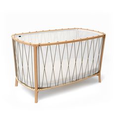 All round and translucent, the KIMI is an evolving bed, perfect for babies from 6 months up to 5 years old. 47.2" x 23.6" Designed without bars, this new bed is a reassuring cocoon which still allows the baby to see the world around him. Moreover, it prevents baby from injuring himself by trapping his leg or arm. This is a unique baby bed, as opposed to a crib, as the mattress does not raise. When the child is ready to sleep in a toddler bed, the KIMI can be turned into an open bed; once your ki Organic Cotton Blanket, Crane Design, Cotton Mattress, Natural Mattress, Bed Dimensions, Baby Bouncer, Mattress Dimensions, Black Bedding, Bed Base