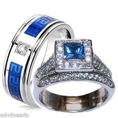 two wedding rings with blue and white diamonds on each ring, one has a matching band