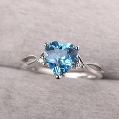 ◆ The ring is handcrafted from sterling silver and decorated with a dazzling 8*8 mm Swiss blue topaz and CZs. It is suitable for engagement/anniversary/daily occasion. ◆ Production Description: Main stone Type: Swiss blue topaz Main Stone Shape: Heart Cut Main Stone Size: 8*8 mm(2.34ct) Side stone: CZ Metal: 925 Sterling silver - Other options available in the drop down menu ◆ Customization: √Free for Add Engraving √Other Metal Type Available √Other Gemstones & Shapes Available √Personalization November Birthstone Engagement Ring, Pastel Blue Rings, Sky Blue Rings, Silver Ring Blue Stone, Silver And Blue Rings, Light Blue Topaz Ring With Brilliant Cut For Wedding, Light Blue Topaz Wedding Ring With Brilliant Cut, Wedding Light Blue Topaz Ring With Brilliant Cut, Light Blue Cubic Zirconia Rings For Anniversary