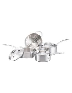 an assortment of pots and pans on a white background