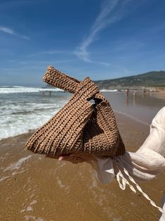 Beige Straw Bag, Raffia Beach Bag, Handmade Summer Bag, Straw Knot Bag, Raffia Knot Bag, Luxury Bag, Crochet Beach Bag, Woven Raffia Bag, - Etsy Ukraine Bohemian Beach Bucket Bag In Pouch Shape, Bohemian Pouch Bucket Bag For The Beach, Bohemian Beach Bucket Bag Pouch, Bohemian Beach Bucket Bag, Beachy Sand-colored Straw Bag With Braided Handles, Summer Woven Straw Pouch Bag, Bohemian Beach Straw Pouch Bag, Beachy Handwoven Shoulder Bag For Beach Season, Straw Beach Bag In Sand Color