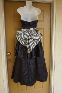 "Gunne sax 1980s party dress. Labeled size 7 -please see measurements, Boned bodice. Zips in the back. Condition - has some color fade at armpits - see last two photos. Measurements taken across front lying flat 16\" across front armpit to armpit 13\" across front of waist 43\" length armpit to bottom" Evening Strapless Ball Gown With Ruffles, Strapless Ball Gown With Ruffles For Party, Vintage Party Dress With Bow, Striped Strapless Party Dress, Striped Strapless Dress For Party, Vintage Corset Dress For Spring Party, Vintage Strapless Corset Dress For Party, Vintage Strapless Formal Dress, Vintage Evening Dresses With Bow