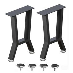 two black metal stools sitting next to each other