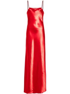 bright red satin finish slip silhouette square neck spaghetti straps curved hem long length partial lining Formal Satin Slip Dress With Square Neck, Elegant Silk Maxi Dress With Square Neck, Sleek Satin Maxi Slip Dress, Silk Maxi Dress With Square Neck For Formal Occasions, Formal Silk Maxi Dress With Square Neck, Silk Maxi Dress For Red Carpet, Sleek Red Dress For Formal Occasions, Sleek Red Dresses For Formal Occasions, Sleek Red Formal Dress