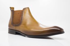 Style: 478-11-Cognac Stunning Burnished Calfskin slip-on Boot from the Carrucci collection features a Double Gore for a perfect fit and a clean welt! Brown Leather Chelsea Boots For Work, Classic Leather Chelsea Boots For Office, Brown Chelsea Boots With Leather Sole For Work, Brown Calf Leather Chelsea Boots For Work, Business Slip-on Chelsea Boots With Leather Footbed, Elegant Brown Chelsea Boots For Fall, Brown Chelsea Boots With Rubber Sole For Work, Elegant Slip-on Chelsea Boots With Rubber Sole, Brown Chelsea Boots With Brogue Detailing For Business