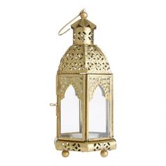 an ornate gold lantern on a white background