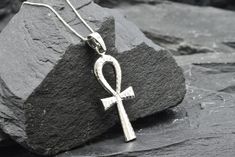 Ankh Cross Pendant made of Solid 925 Sterling Silver ☞ made to last.Matching Ring & Earrings - please ask meDetails:• Hammered Cross Pendant• Dimensions: Pendant Height 36mm, Width 17mm• Free Complimentary Chain• Solid 925 Sterling SilverSKU P-01302 Handmade Symbolic Jewelry, Symbolic Silver Dangle Jewelry, Fine Jewelry, Hallmarked Sterling Silver, Symbolic White Gold Jewelry For Gift, Symbolic Silver Pendant Jewelry, Nickel Free Ankh Jewelry Gift, Handmade Ankh Spiritual Jewelry, Nickel-free Ankh Shaped Elegant Jewelry, Spiritual Ankh Shaped Jewelry For Gifts