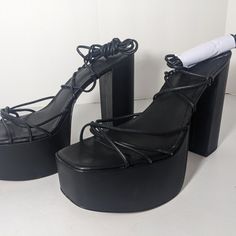 New Without Box (Very Minor Marks Or Scuffs May Exist From The Distributor Storing It With No Box) Womens Gianni Bini Platform Block Heeled Sandals Strappy Ankle Tie Leather Upper / Manmade Sole Color: Black Size 11m Formal Lace-up Synthetic Sandals, Formal Block Heel Lace-up Sandals, Summer Black Faux Leather Heels, Black Lace-up Sandals For Evening, High Heel Lace-up Sandals With Stacked Heel For Party, Party Platform Lace-up Ankle Strap Sandals, Evening Block Heel Lace-up Sandals, Chic Open Heel Lace-up Platform Sandals, Chic Lace-up Sandals With Platform And Open Heel