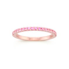 a pink diamond ring on a white background