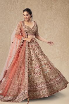 "This Bridal Lehenga BL-217 features intricate sequence and bead work, adding a touch of glamour to any bride's wedding day ensemble. With its delicate detailing and high-quality craftsmanship, this lehenga is sure to make any bride feel like a true princess on her special day. Make your wedding dreams a reality with the Bridal Lehenga BL-152." WASH CARE INSTRUCTIONS - Please Dry clean only when it is applicable! Ready to Ship! Semi-stitched Kundan Gown For Wedding, Bollywood Style Wedding Gown With Resham Embroidery, Festive Wedding Dress With Pallu For Ceremonies, Traditional Fitted Wedding Gown, Festive Traditional Drape Wedding Dress, Traditional Drape Lehenga For Wedding, Anarkali Wedding Dress With Pallu, Elegant Choli For Ceremony With Traditional Drape, Wedding Choli With Zari Work