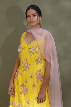 Dance the night away at sangeet and weddings in this alluring bright yellow embroidered sharara suit. It comes with a powder pink dupatta. Shop designer suits in USA from Pure Elegance. Traditional Yellow Palazzo Set With Sheer Dupatta, Yellow Chinon Palazzo Set With Dupatta, Yellow Palazzo Set With Sheer Dupatta For Wedding, Yellow Floor-length Dupatta For Reception, Yellow Chinon Palazzo Set With Dori Work, Yellow Palazzo Set With Dori Work In Chinon, Wedding Palazzo Set In Yellow Chanderi, Yellow Chanderi Palazzo Set For Wedding, Wedding Yellow Chanderi Palazzo Set