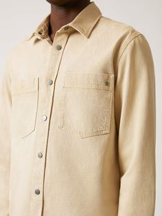 Our cotton overshirt has buttoned chest pockets for a breathable workwear-inspired look. Made partially of recycled cotton and finished in a light neutral wash, it has an earthy, casual edge. #B0211053-70134 Fabric: 80% cotton, 20% recycled cotton Relaxed Fit Collared Shacket, Utility Cotton Shacket With Washed Detail, Washed Cotton Utility Shacket, Utility Style Washed Cotton Shacket, Beige Cotton Collared Shacket, Everyday Washed Cotton Shacket, Everyday Cotton Washed Shacket, Beige Button-up Shirt With Patch Pockets, Relaxed Fit Washed Cotton Shacket