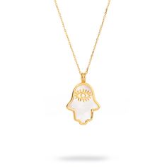 Harness the power of protection and luck with the Pearl Divine Hamsa & Evil Eye Pendant Gold Vermeil Chain Necklace. This elegant pendant, crafted from 18k gold-plated sterling silver, features a pearl Hamsa hand design with a gold evil eye symbol nestled inside. Designed to not only elevate your style but also provide spiritual protection and good fortune, this necklace is the perfect blend of chic and meaningful. Paired with a gold vermeil chain, it brings the power of these ancient symbols into your everyday look. Details 18K gold plated on sterling silver Pearl Necklace length 20" with pendant and 2'' extender Pendant height 0. 8'' Pendant width 0. 6'' Avoid contact with chemicals, makeup, parfume. Do not use dips or abrasive cleaners on necklace. To clean and brighten it up your neckl Gold-plated Evil Eye Amulet Necklace, Gold Plated Evil Eye Amulet Necklace, Yellow Gold Evil Eye Spiritual Necklace, Spiritual Yellow Gold Necklace With Evil Eye, Spiritual White Gold Gemstone Necklace, Spiritual Yellow Gold Evil Eye Necklace, White Gold Spiritual Necklace With Gemstone, 14k Gold Spiritual Necklace For Good Luck, Spiritual 14k Gold Necklaces With Charms