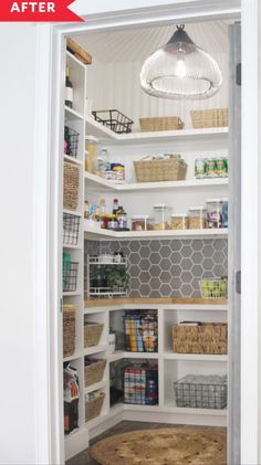 an open pantry door with baskets and other items in the shelves on either side of it