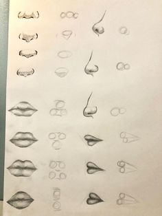 a drawing of different types of lips and glasses on a piece of paper with scissors