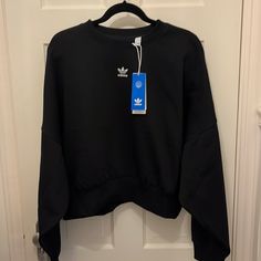 Women’s Oversized Black Crewneck With White Adidas Logo Embroidered In Front. Size M Shoulder To Hem 22” Smoke Free Home Matching Pants Available Casual Adidas Tops With Ribbed Cuffs, Adidas Casual Tops For Fall, Adidas Relaxed Fit Tops With Ribbed Cuffs, Black Crew Neck Top For Spring, Adidas Relaxed Fit Sweatshirt For Spring, Adidas Casual Sweatshirt For Fall, Casual Adidas Long Sleeve Sweatshirt, Adidas Oversized Crew Neck Top, Oversized Adidas Sweatshirt With Long Sleeves