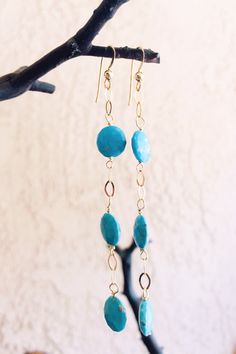 Coin-Shaped faceted Sleeping Beauty Turquoise dangle on a 14k gold-filled chain and ear hooks. 14k Gold-filled Turquoise Jewelry With Ear Wire, Elegant Turquoise 14k Gold Filled Earrings, Turquoise Faceted Drop Earrings, Sleeping Beauty Turquoise, Ear Hook, Turquoise Earrings, Chandelier Earrings, Sleeping Beauty, Gold Filled