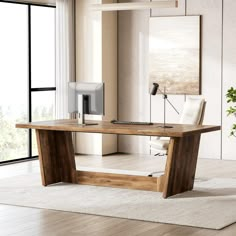 a wooden desk with a computer monitor and keyboard on it in front of a large window